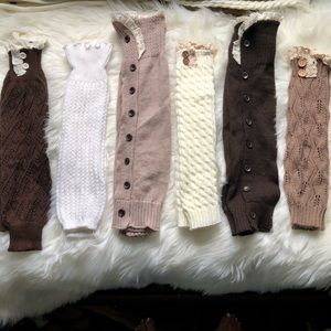 6 pairs of leg warmers with boot cuff tops.